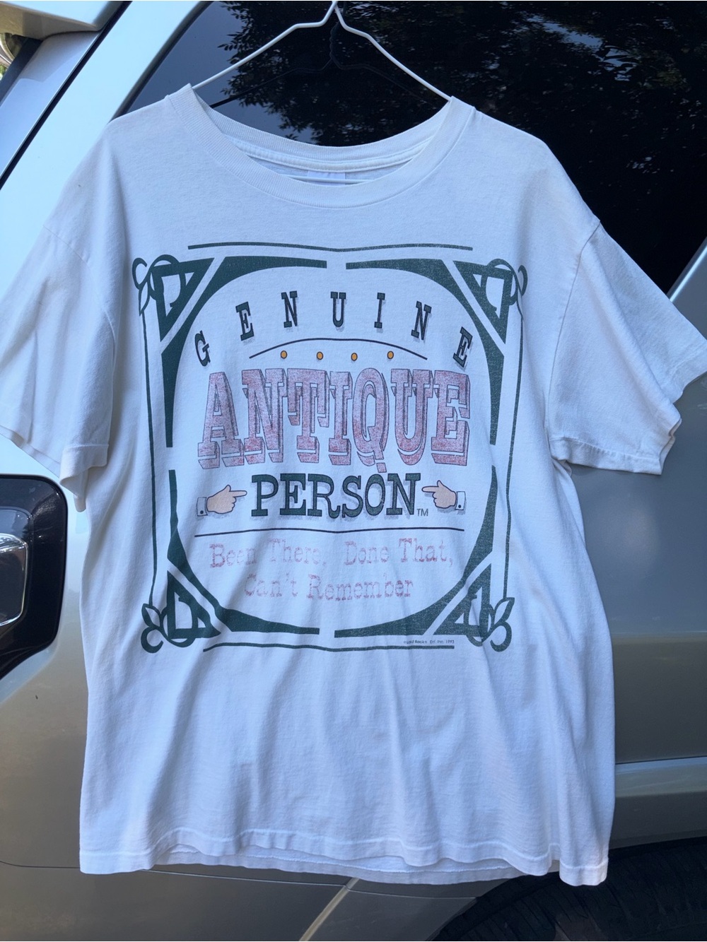 Vintage single stitch Genuine Antique Person shirt dated 1993